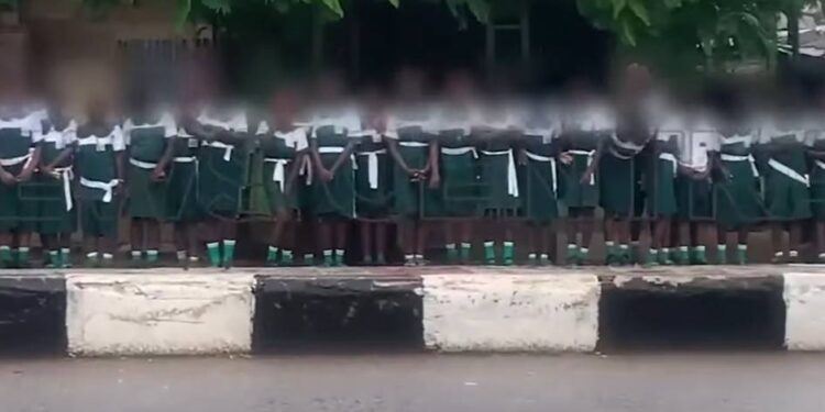 Outrage as Schoolchildren Allegedly Forced to Welcome Tinubu in the Rain Despite Public Holiday Declared by Gov Alia